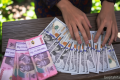 Topics Covered: Menkeu Purbaya Sebut Rumor di Pasar Jadi Penyebab Rupiah Melemah Hampir Sentuh Rp 18.000