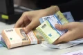 New Policy: Rupiah Menguat 76 Poin, Sentimen Timur Tengah Masih Dominan